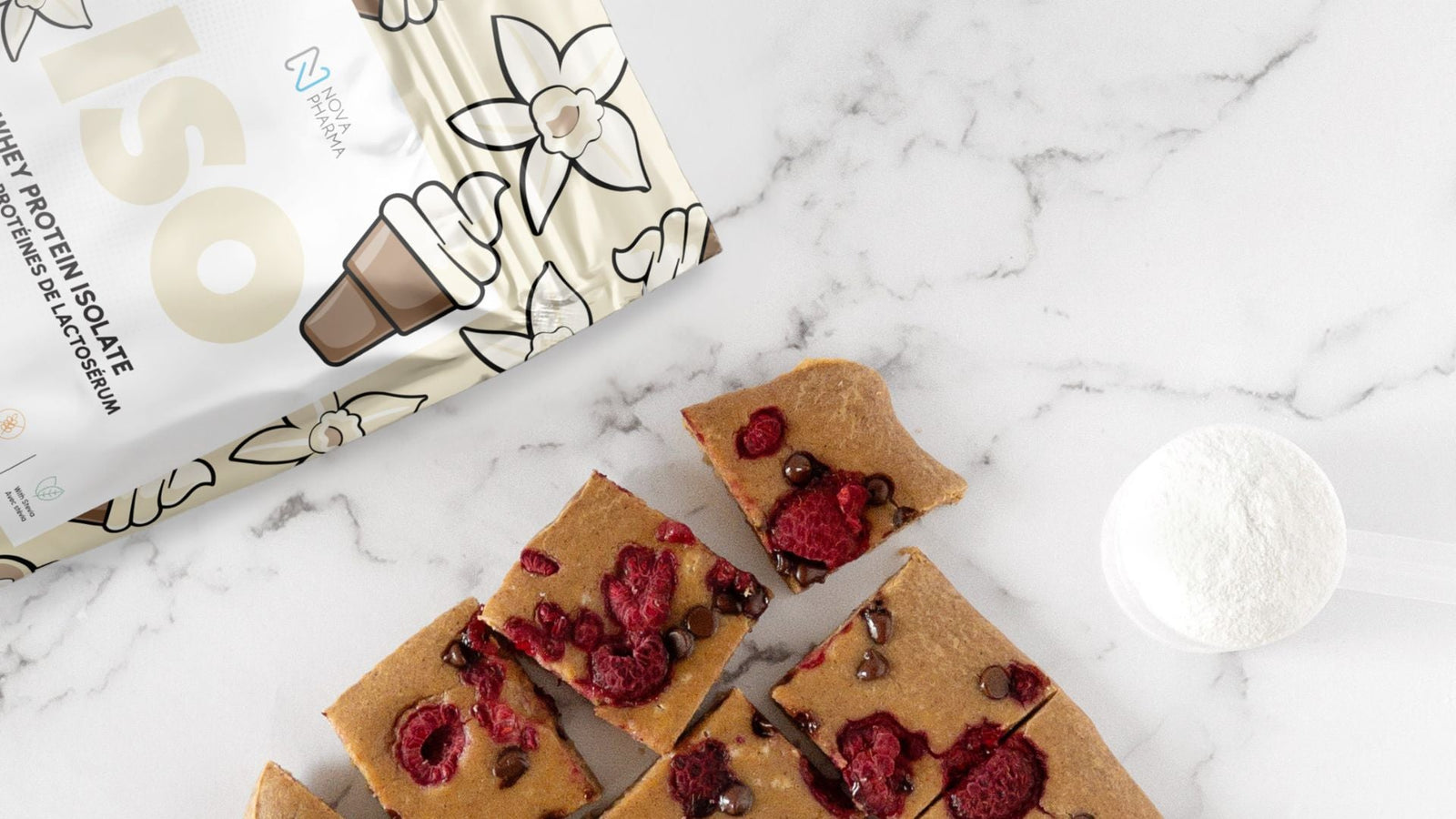 Choco raspberry blondies made with the Vanilla ISO protein by Nova Pharma