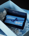 A 50$ gift card from Nova Pharma displayed inside an open light blue gift box filled with white crinkle paper.